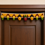 Decorative garland with flowers and patterns on a wooden door