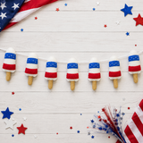 Decorative banner with red, white, and blue ice cream popsicles on a wooden background with American flags and stars.