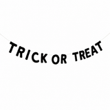Black 'TRICK OR TREAT' banner on a white background