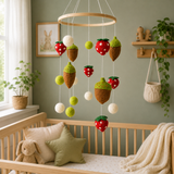 Nursery room with a wooden crib, decorative mobile, and plants.