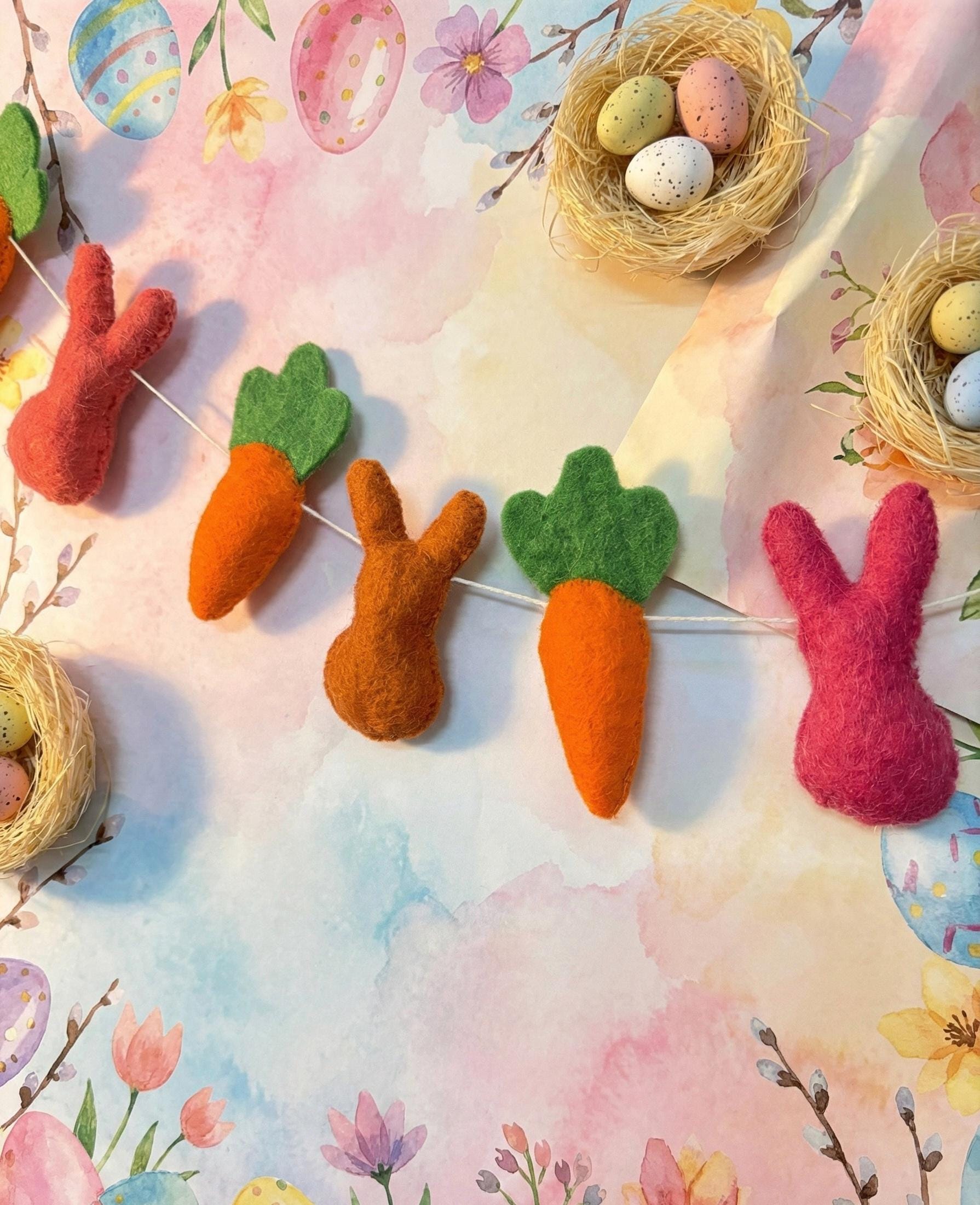 Decorative Easter garland with bunnies, carrots, and eggs on a colorful floral background.